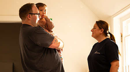 Parent communicating with staff